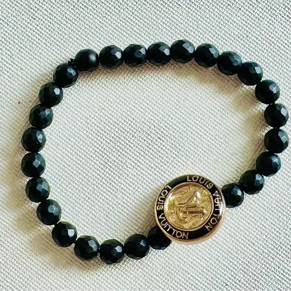 LOUIS VUITTON Black Beaded Bracelet with Gold LV Medallion - Picture 2 of 3
